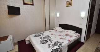 Отель Hotel Taco Бухарест Стандартный двухместный номер с 1 кроватью или 2 отдельными кроватями-9